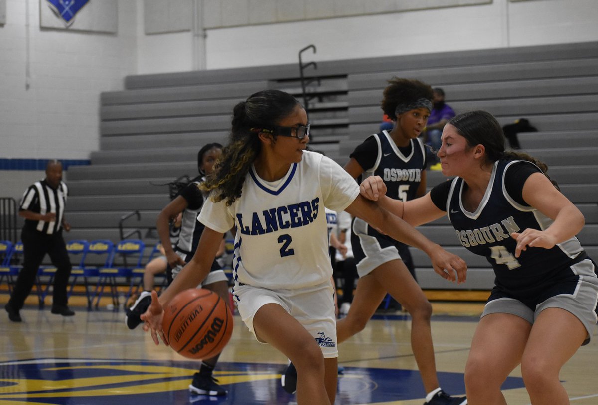 After only winning three games the last three years, the Lewis girls' hard work is starting to pay off, with a 4-0 start this season. Last night Donnie Goodwin had 15 points, seven boards, and five assists to lead a 43-38 Lancer win over Osbourn. Story, box score here: