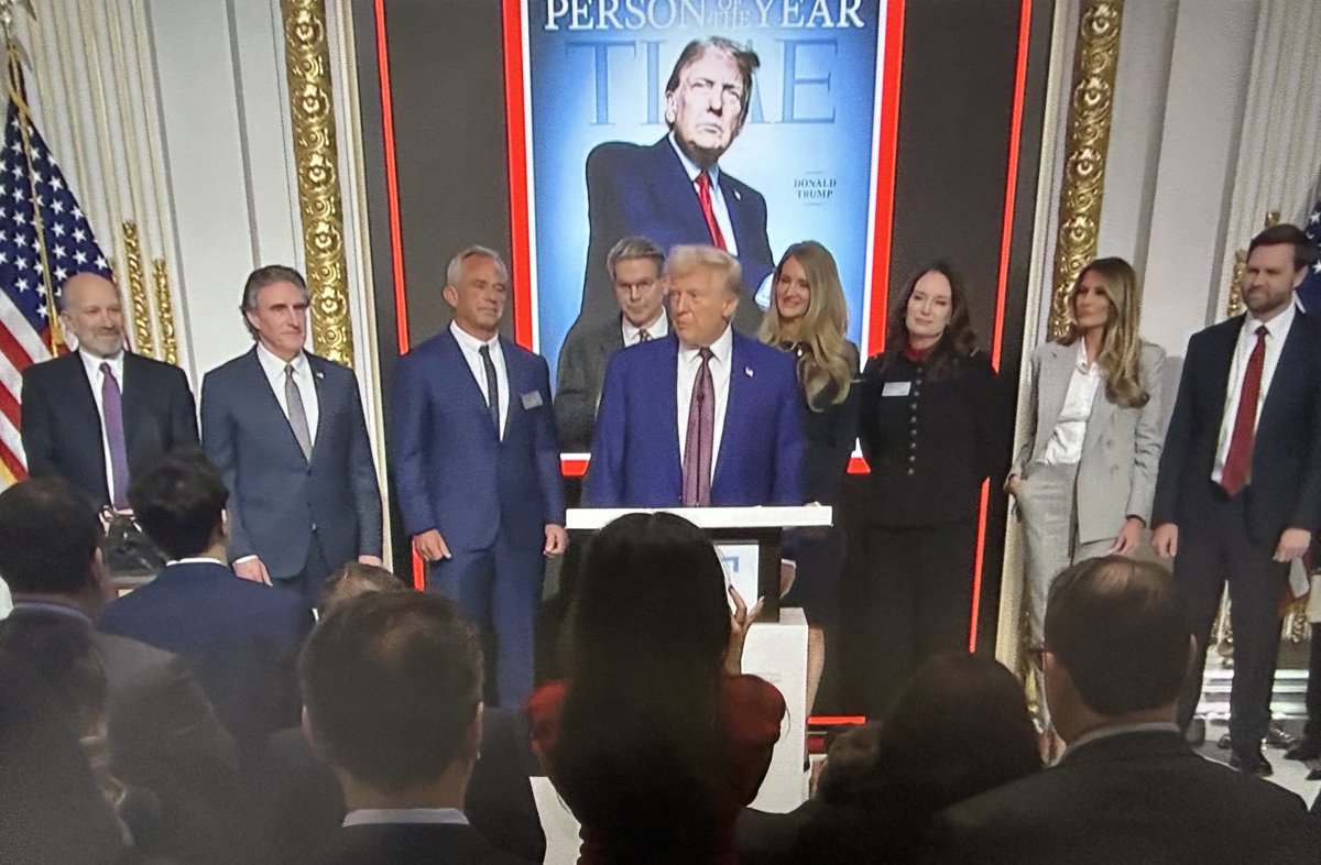Trump speaks ahead of ringing the bell at the NYSE as part of Time Magazine “Person of the Year” rollout