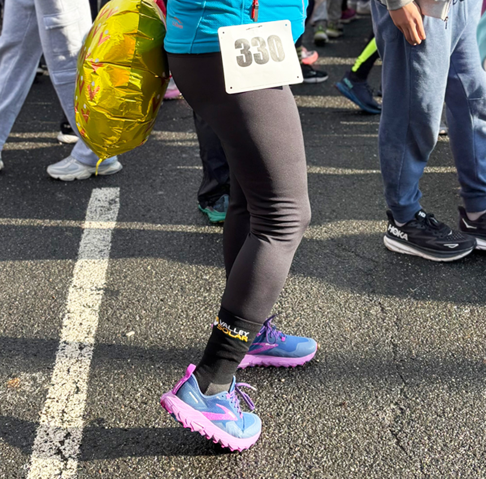 ValleySolarMA's tweet photo. Valley Solar’s sponsorship theme at the Hot Chocolate Run was, “Feel the Power of Community,” because when we move together, we are powerful. If you were at the event, we hope you came by and received a pair of our “Feel the Power” running socks from the Valley Solar booth! https://t.co/7C51Xw845n