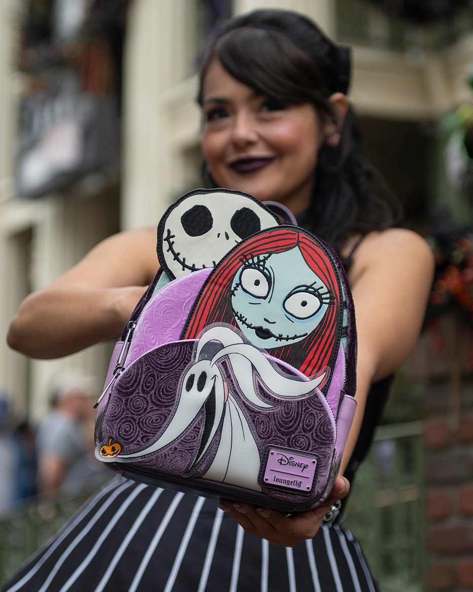 Loungefly's tweet photo. Now and forever 🖤  
🎃: This triple pocket bag is available now only from @707street https://t.co/rovdLG9G0V