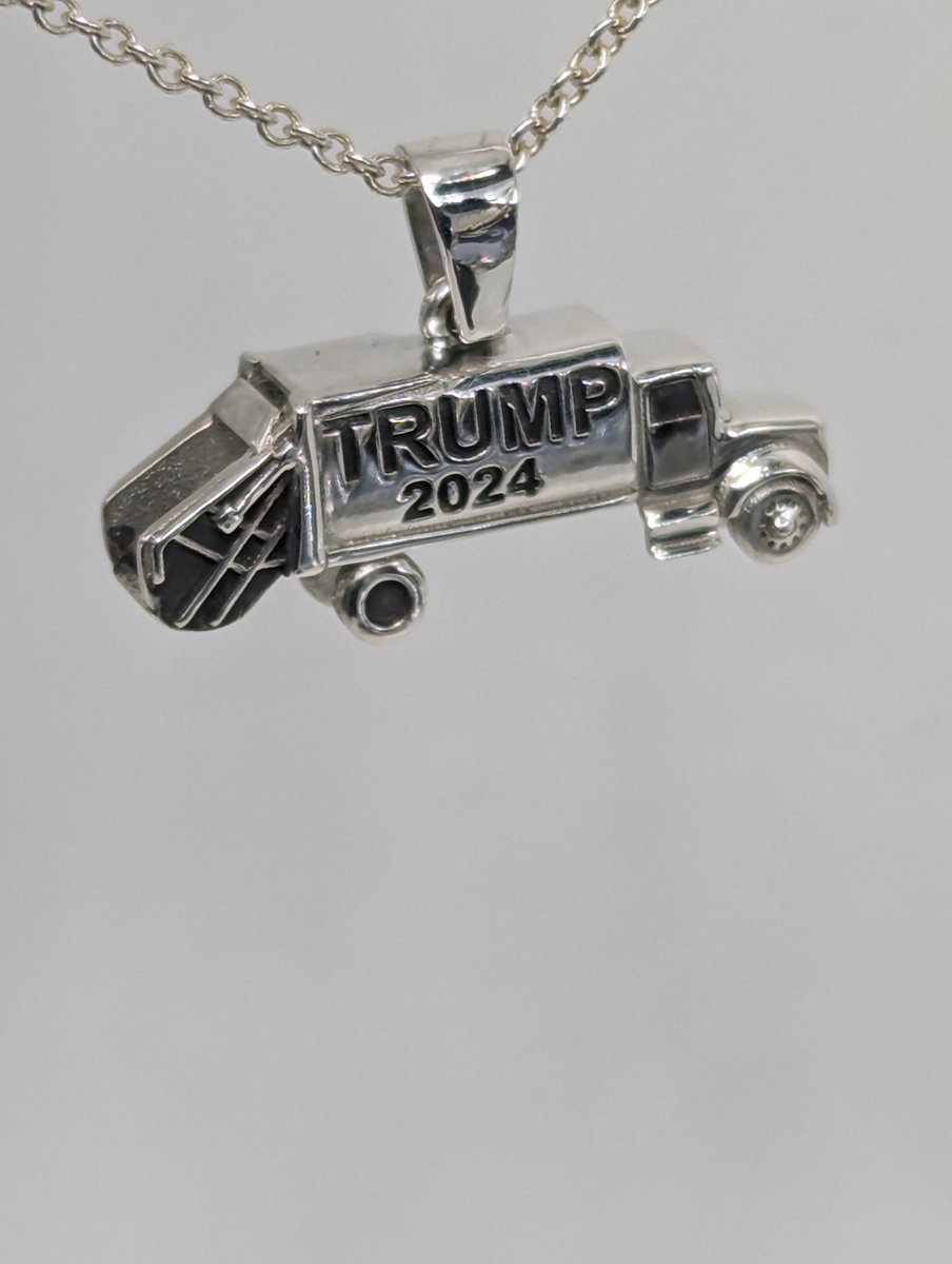ThomasKurilla's tweet photo. Commemorative Trump garbage truck pendant #Trump2024 #trumptruck #TrumpsAmerica #TrumpWON2024 #TrumpDance #TRUMPWON #ElectionResults #elections #2024 #MAGA #MAGATRAIN #MAGA2025 #jewelrygifts #jewelry #pendant #finejewelry #designer #jewellry https://t.co/RLh85ICGBQ
