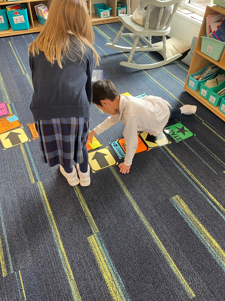 DCDSchool's tweet photo. Our first graders had a blast during Hour of Code, jumping into "Hopscotch Coding" while retelling a story. They learned coding concepts like sequencing and loops—all while having fun and staying active! #HourofCode #DCDSAcademics #DCDSFun https://t.co/cmsfevzm3z