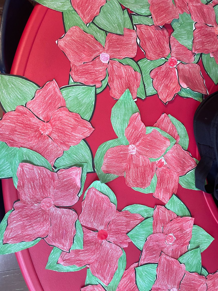 Bwatson_ics's tweet photo. First Grade listened to the story The Legend of the Poinsettia by Tomie dePaola and made their own special poinsettia craft  @icschool_online https://t.co/u6qGR78ePk