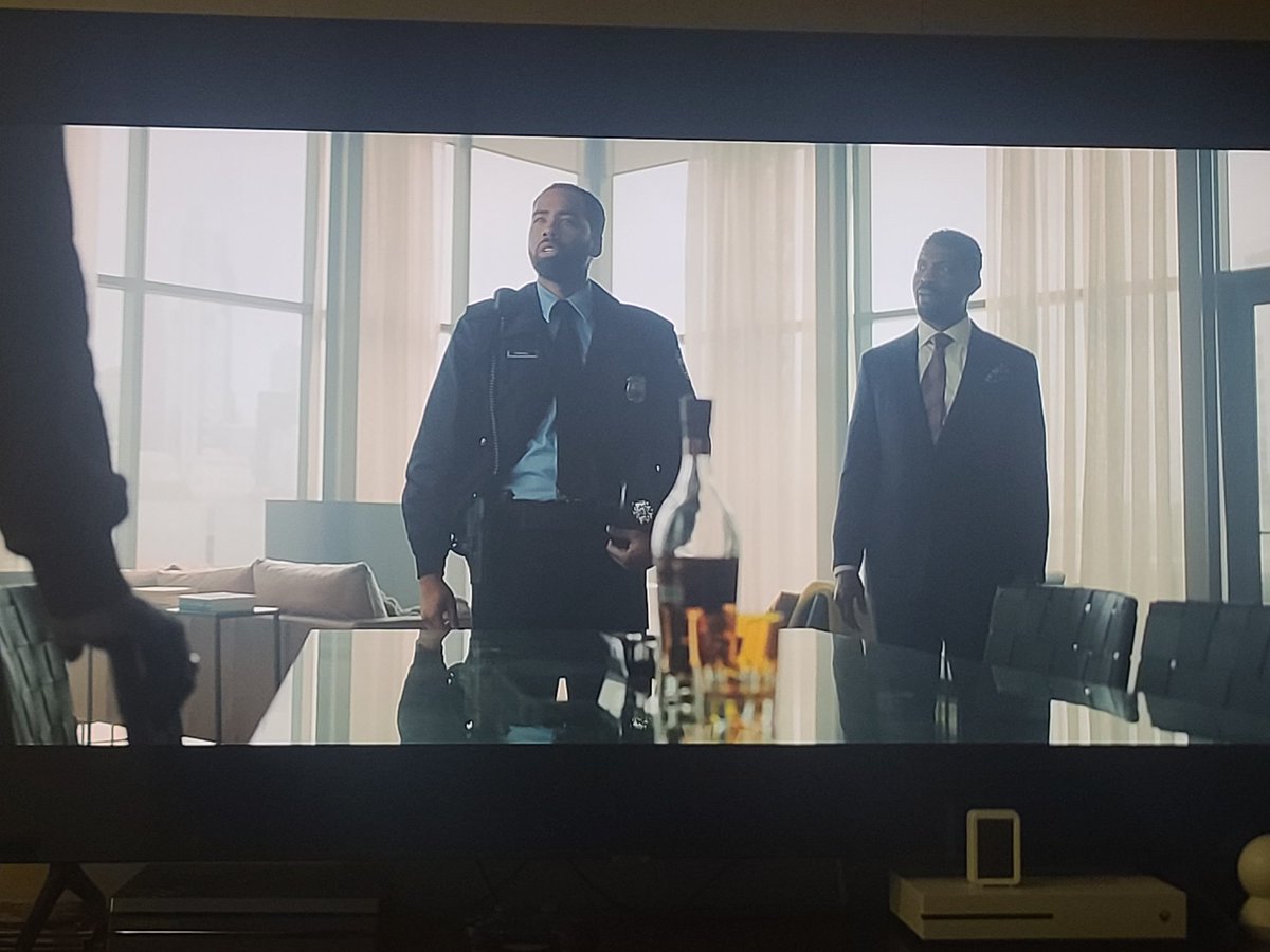 Hmmm... I'm not sure what it says about me that I can see a blurry bottle in a TV show and think to myself, "Oh, that's a bottle of  Glenmorangie 18-year Extremely Rare whisky."