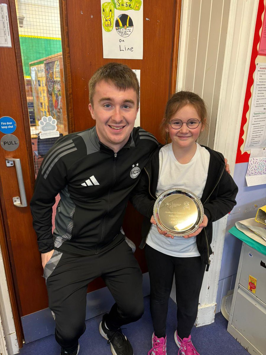 Paul from <a href="/AFCCT/">Aberdeen FC Community Trust</a> proudly presenting the AFCCT Young Achiever award 🏆  Well done! <a href="/CulterSchool/">Culter School and Nursery</a> #CulterValues