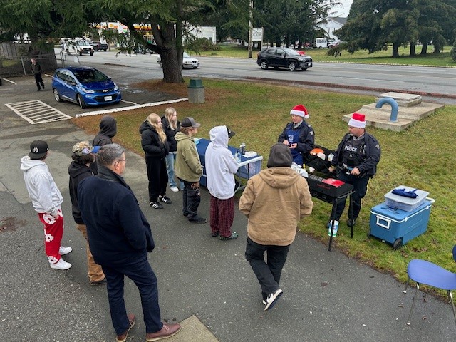 SD62_Sooke's tweet photo. 🍞✨ This week at Westshore Secondary: Students and staff joined the @WestshoreRCMP Community &amp; Indigenous Policing Unit and Elder Earl Claxton for a bannock-making (and tasting) demo! 

Always special to learn and connect with Elder Claxton's stories and teachings. https://t.co/jYPVP5qD1X