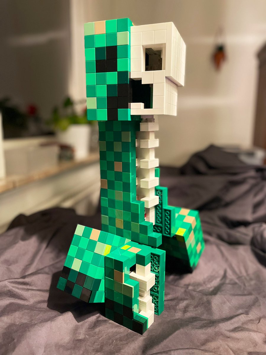 There have been many interpretations of the anatomy of Minecrafts probably most iconic mob, the Creeper. This is my interpretation rendered in LEGO. 1900 bricks, standing 42 cm tall, this harbinger of boom will sneak up on when you least expect it. #lego #afol #moc #minecraft