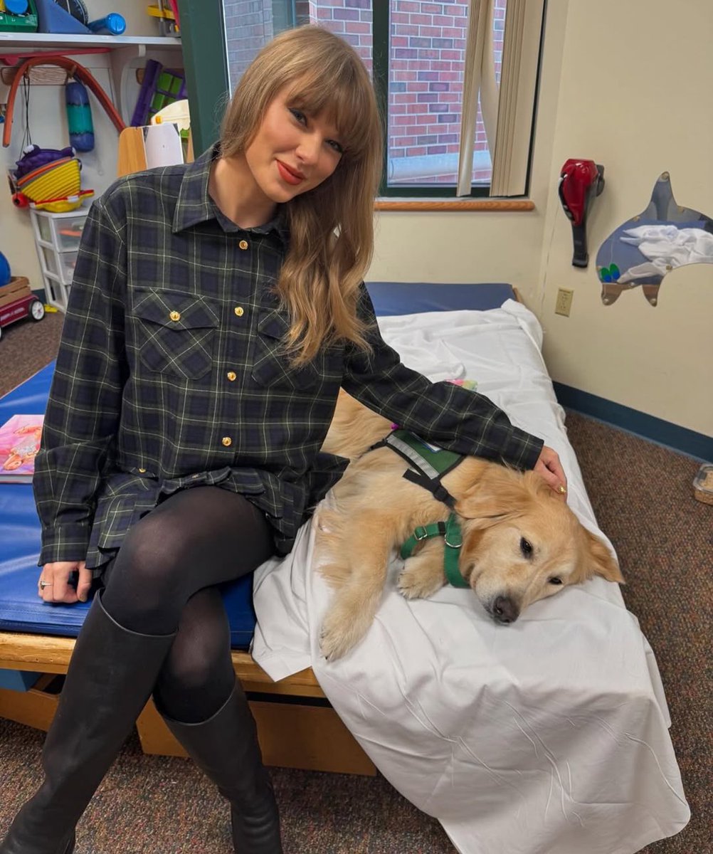 SwiftNYC's tweet photo. More of Taylor with the service dog at the children’s hospital in Kansas City recently 🥺🤍 https://t.co/Z83u8A2mMl
