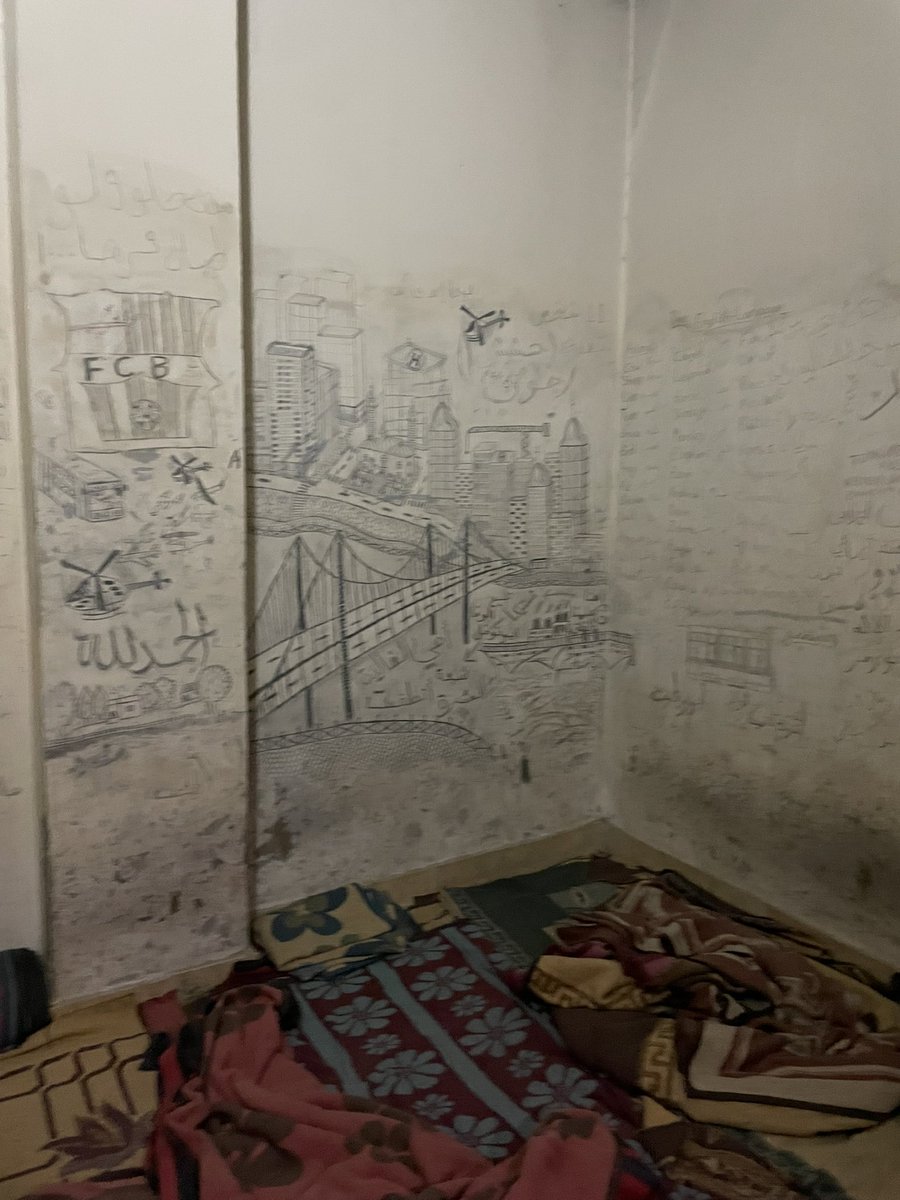 In other cells, prisoners had drawn in the walls - incredible art without pens, just scratching at the paint - decorations, messages of love and desperation and English lessons.