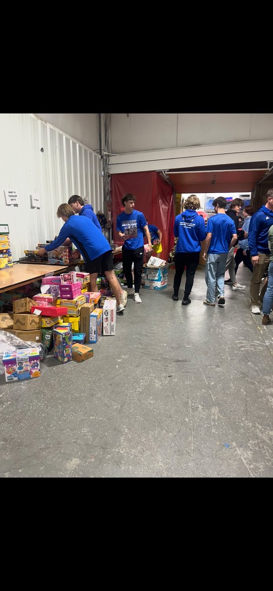 Falcon baseball helping at Mission Southside before the holidays!