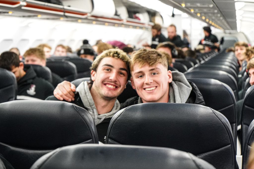 SC_Pride's tweet photo. Smiling knowing that they earned a flight to the NCAA Championship Quarterfinals

The #SpringfieldCollege football team is headed to Illinois as they prepare to take on No. 1 ranked North Central on Saturday! #d3fb 🔻🏈✈️ https://t.co/Cfn8Oz1I0X