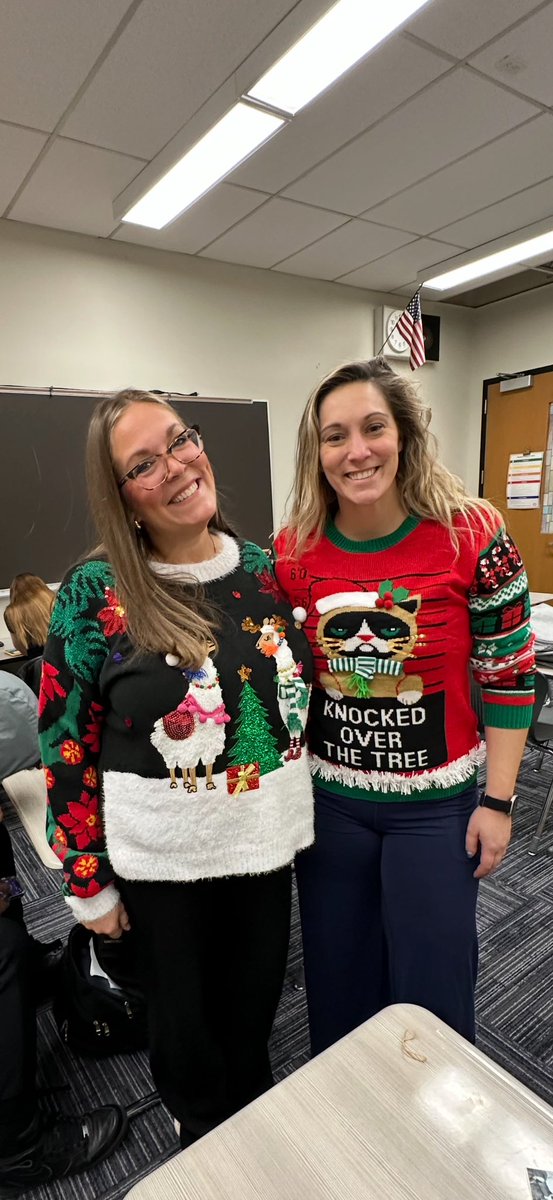 CoachKJordon's tweet photo. Gotta love ugly sweater day! Fa la la la llamas and a guilty cat! 😂 https://t.co/CqVfBsABcY
