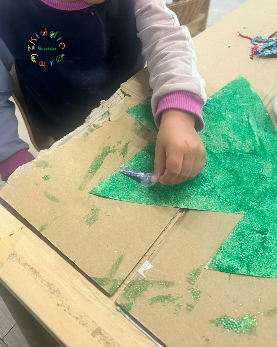 KiddieCareN's tweet photo. The children have been busy decorating our festive display board, painting a big Christmas tree and adding sparkly decorations. They’ve also made their own glittery baubles with paint and sequins to take home—what a magical way to celebrate the season! 🌟🎁
#kiddiecare https://t.co/9mA0LObLHa