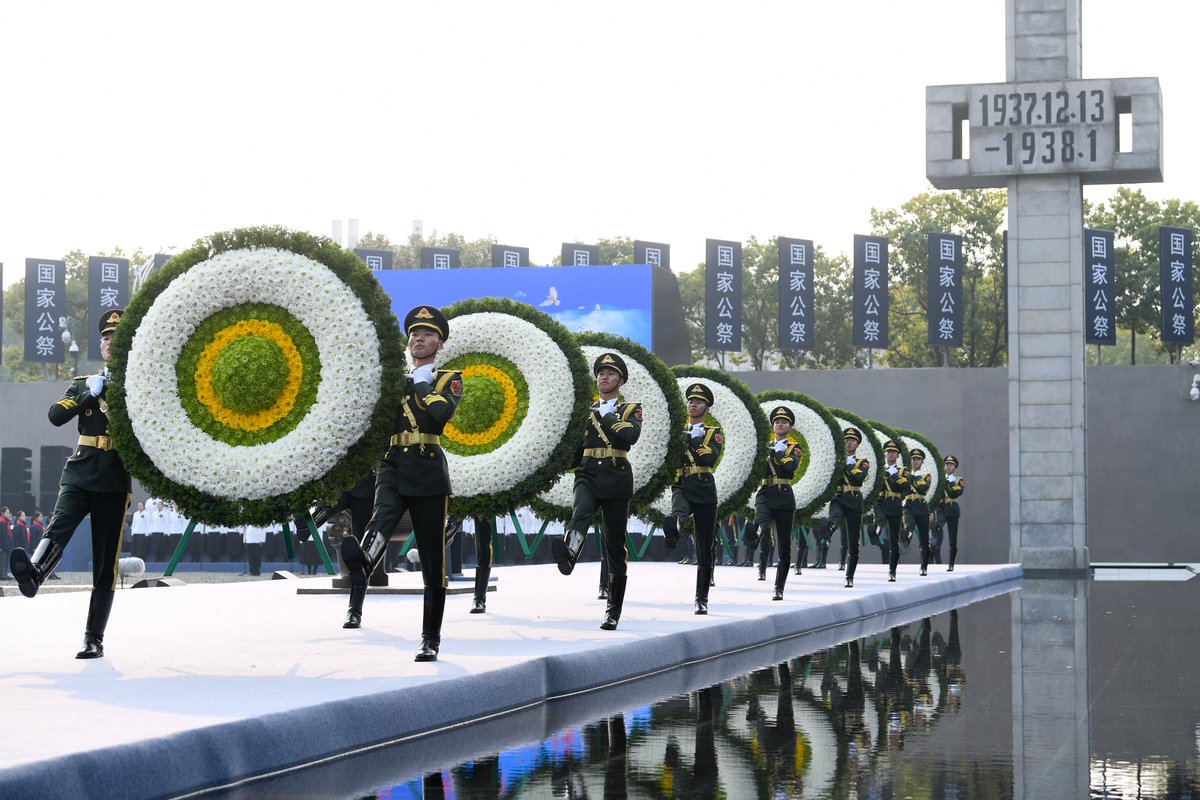 China__Focus's tweet photo. The 11th national memorial ceremony for the Nanjing Massacre victims is held at the Memorial Hall of the Victims in Nanjing Massacre by Japanese Invaders in Nanjing.

At 8 a.m., China's national flag was flown at half-mast at the square of the Memorial Hall.

At 10:01 a.m., sirens began to blare. Drivers in the downtown area stopped their cars and honked their horns, while pedestrians paused for a moment of silence in remembrance of the victims.