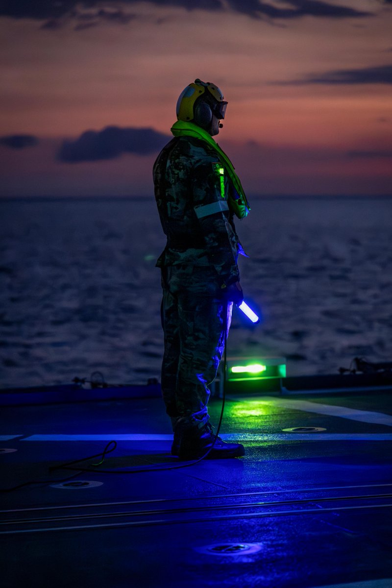 Australian_Navy's tweet photo. #OurNavy are a guiding light as MH-60R Seahawk helicopter 'Scarecrow' conducts vertical transfers for #HMASStuart regional presence deployment in the Indo-Pacific IPE24. https://t.co/9xv2erwdmn