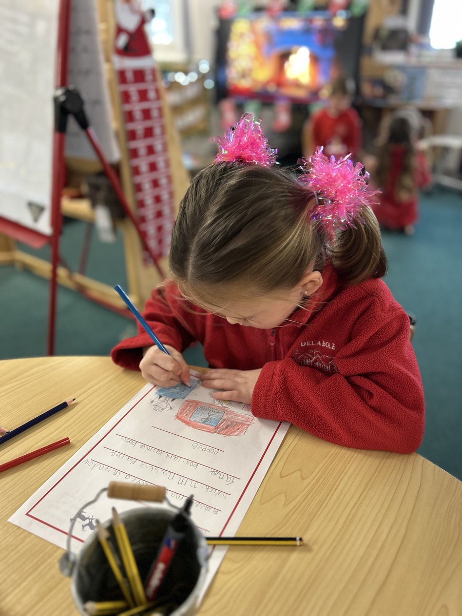 delabole_school's tweet photo. Class 1 have been busy writing their very important letters to Santa. Then our very own Class 1 Elf took these letters to Santa's post box in the village 🎅 https://t.co/6kbZOQNAq8