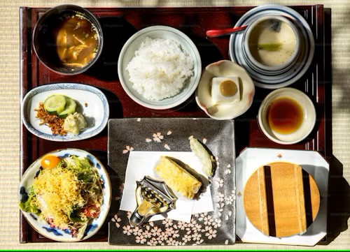 FavoriteCute251's tweet photo. A feast for the eyes and the palate! This traditional Japanese meal is a harmonious blend of flavors, textures, and colors. From the fluffy white rice to the delicate miso soup, every dish is a testament to the art of Japanese cuisine. https://t.co/FhiF4msvKT