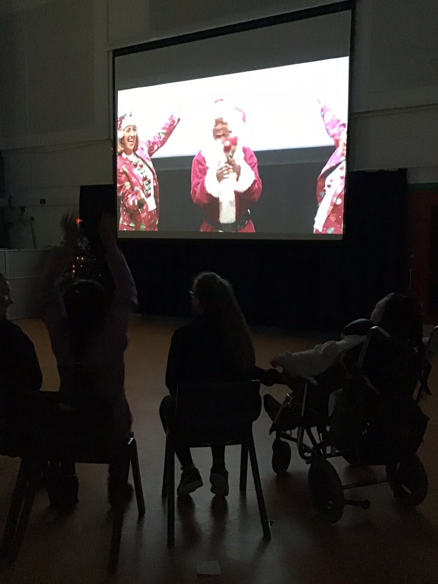 Fairfieldstweet's tweet photo. A great morning ! We are watching the @singinghands virtual Christmas show this morning all together in the hall. As you can see the pupils are really enjoying themselves joining in the songs and signing. #singinghands https://t.co/5AJAILU0eb