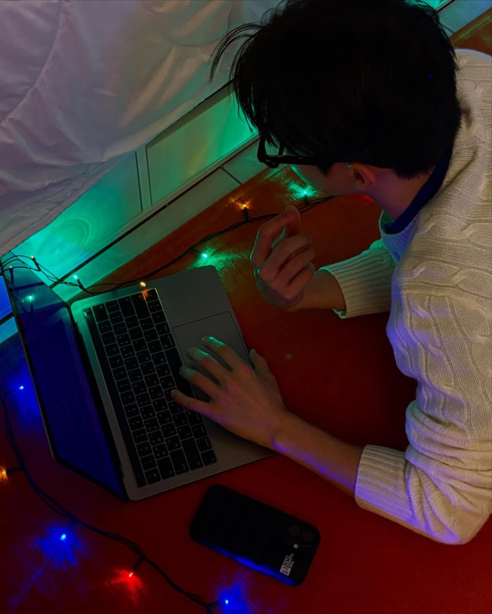 Tangled in lights, but it's all part of the fun. The festive colors bring warmth to the night, serving as a soft reminder that Christmas is just around the corner! 🎄