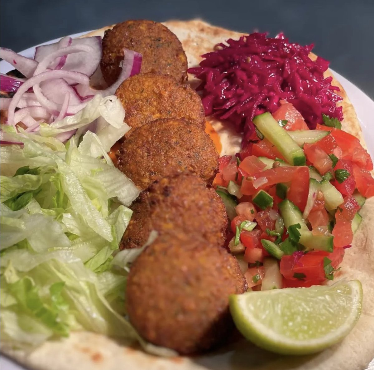 We’re proud to have <a href="/Zaytoon_Dublin/">Zaytoon</a> supporting our Skills Wall! 🏐💚

Their falafel wrap is a must-try – crispy chickpea patties, fresh parsley, &amp; spices,all handmade and 100% vegan. Packed with flavour &amp; perfect for healthy eating! 🌿✨
#NaomhOlaf #NaomhOlafSupporter #SkillsWall