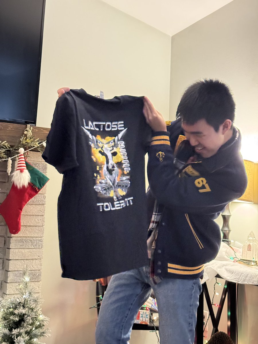 Some white elephant highlights from <a href="/YatrikShahLab/">Shah Lab</a> holiday gathering! Squidward tapestry, book about stress free productive, and lactose tolerant T-shirt 🐄🦑