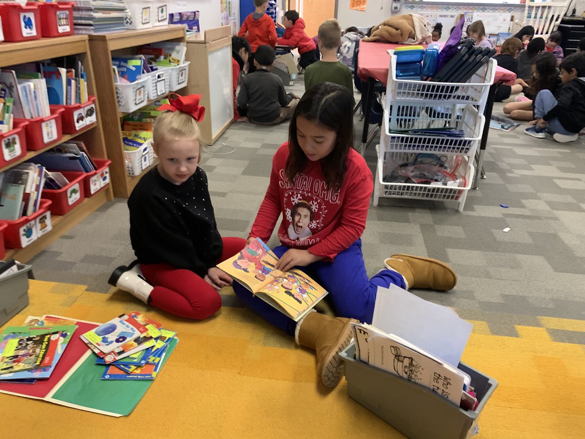 Reading with our Kindergarten buddies today.