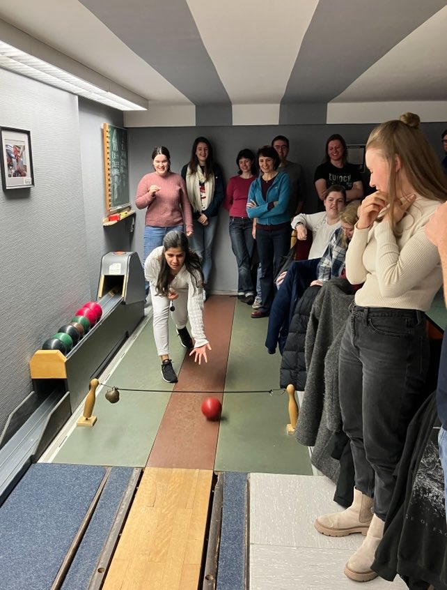 Fun at the Meyer lab Christmas party with crash course in German culture: playing skittles. But who are all these people…?