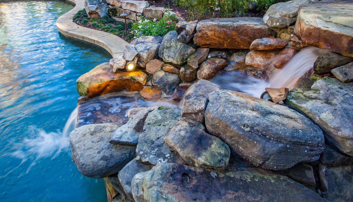 LndscapeStudio's tweet image. Add water features such as ponds, fountains, or waterfalls to create a calming ambience. The sound of running water can be soothing and mask unwanted noise. #waterfeature #landscaping