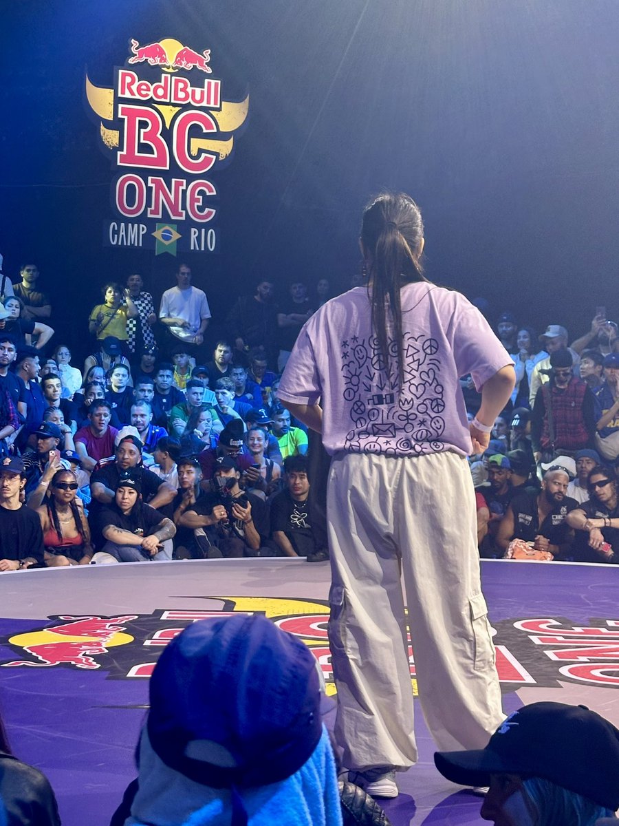 <a href="/IsisGranda/">I s i s Granda</a> rocking the <a href="/NounsTown/">Nouns Town</a> t-shirt at RedBull BC One last chance cypher