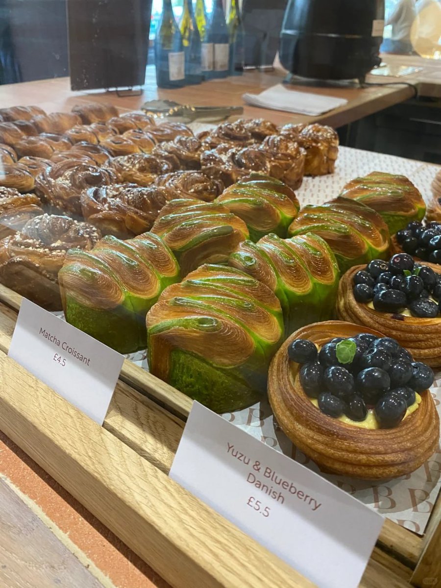 SilverthorneEsq's tweet photo. A delightful spread of drinks and pastries featuring a blueberry Danish and a green swirl pastry, paired with latte art and a matcha drink. https://t.co/N1ZbRjB6AY