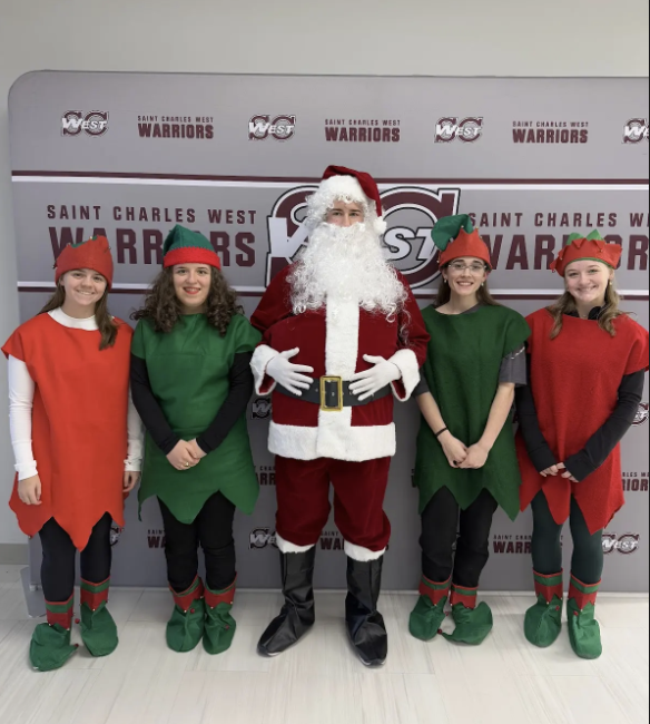 StCharlesWNHS's tweet photo. HO HO Here they come!! Santa and his elves are on their  way to deliver letters from the Big guy himself!! Look out Monroe and Null!! https://t.co/vFpmPZDJot