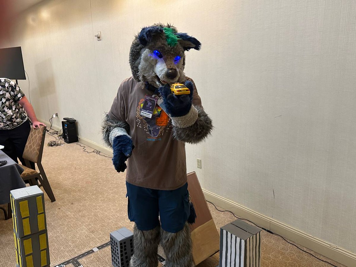 TokalaMacrowolf's tweet photo. Happy Friday the 13th. I don't have a mask, but I do have the power to shrink this cab. Scary enough, right? #FursuitFriday #fursuitfridaythe13th https://t.co/eKpOmcthm8