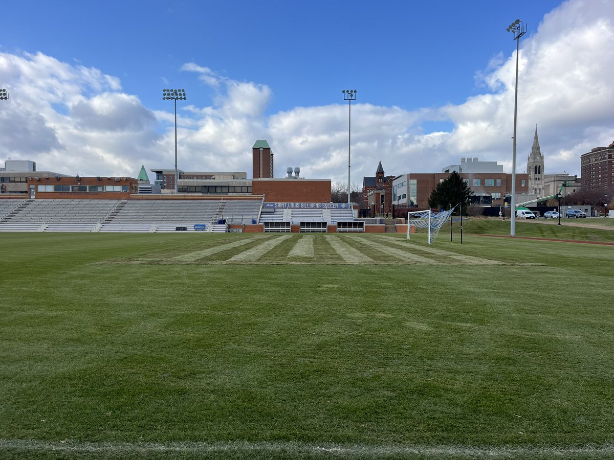 Laser grading and installing new HGT on goal boxes for St. Louis University.