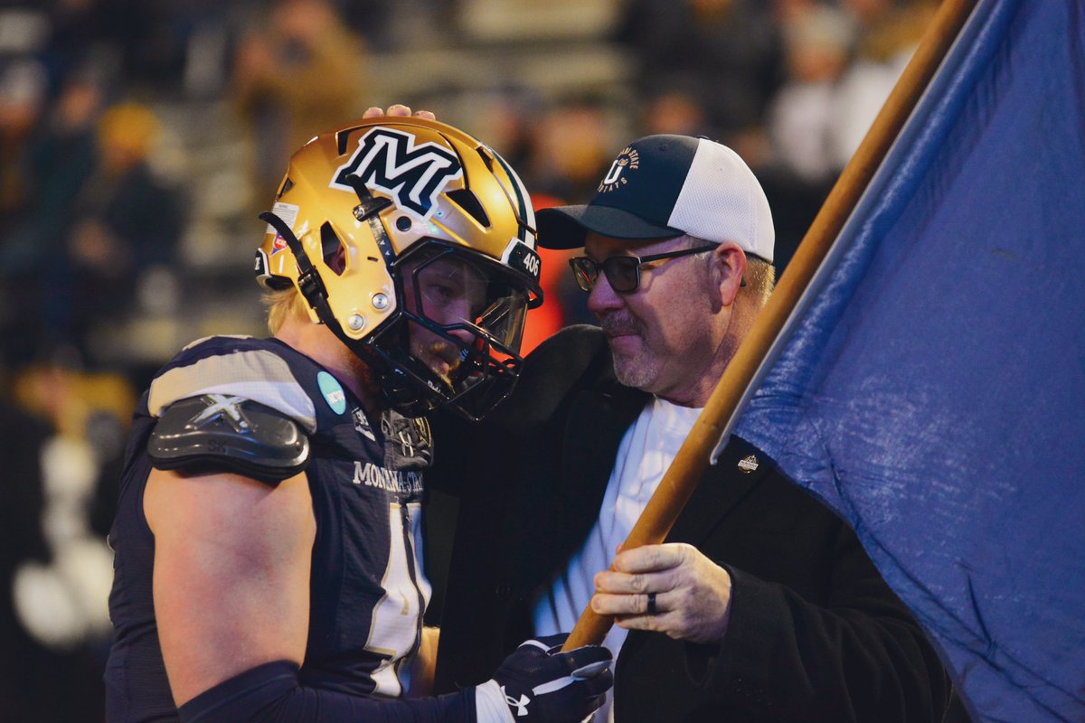 Montana State legend Mark Fellows of Choteau hands the MT flag to Brody Grebe before the No. 1 Cats kickoff against No. 8 Idaho in the FCS Playoffs. 

#mtscores