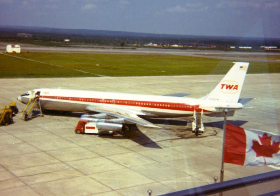 TWA B707 at Gander c.1973. TWA was one of the first companies to use Gander airport in 1946 on a scheduled basis. TWA had an ops office at the airport with a full compliment of dispatchers &amp; AMEs stationed in Gander to service their fleet.