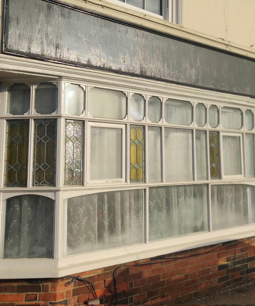 ColCivicSociety's tweet photo. Today's #AdventWindow can be found on the front of the former "Beer House"  (ex Bakers Arms pub at 126 Magdalen Street. The premises were first recorded as a Beer House in 1832 &amp; closed as a pub in 2012.

What an unusual mix of shapes and designs - it's even got stained glass... https://t.co/uhdyDeZAEF