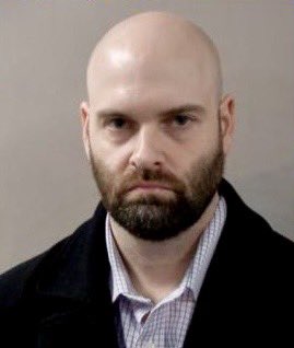 Michigan police officer, Alexander Stachura, has been arrested for possessing images of children being sexually abused.