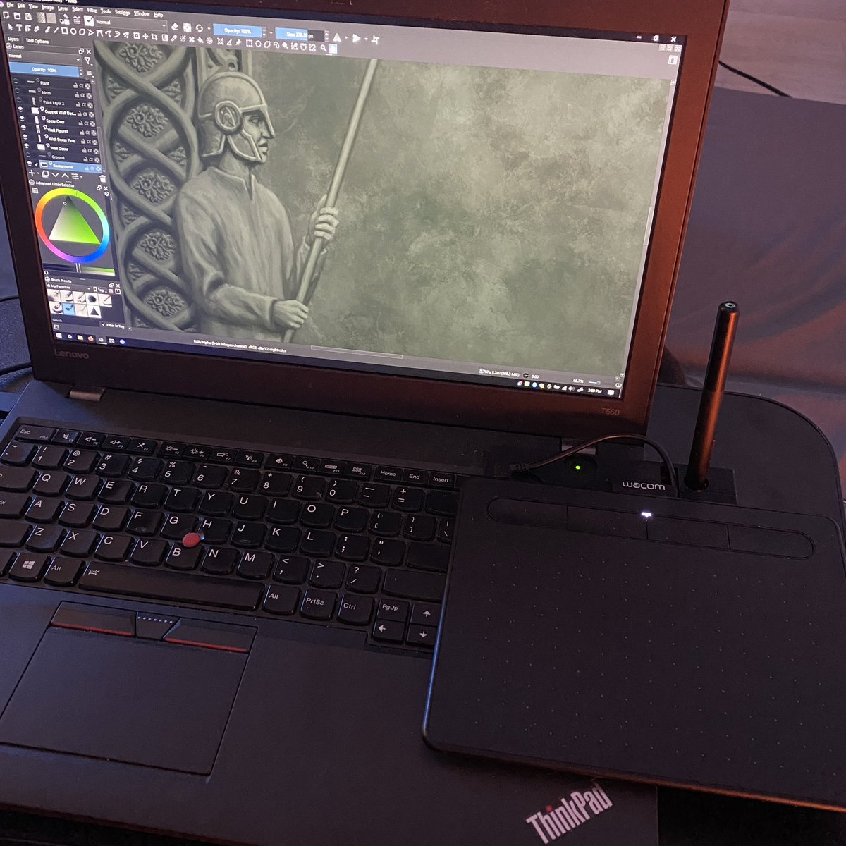 ghost_from_void's tweet image. My art setup for the past two years. Made a 3D printed bracket to mount my wacom to my laptop so I can work in the laziest positions imaginable 😂

Also, that's a wip of a possible background image for one of the screens in my game.

#art #artmoots #wip #gamedev #indiegamedev