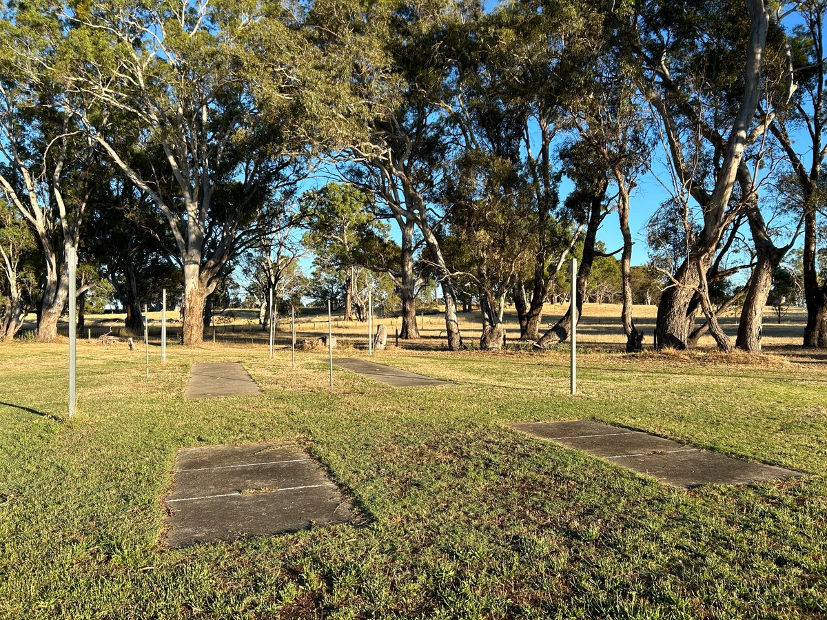 RobCross10's tweet photo. The ghosts of net sessions past. Cloudless blue skies over Apsley football ground, Victoria. @abcsport https://t.co/HnATVp2Ska