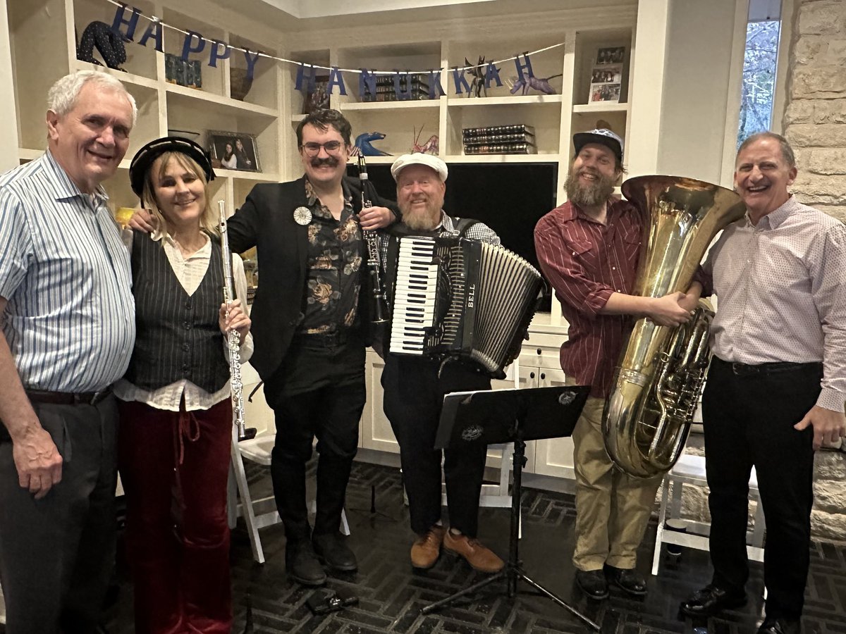 RepLloydDoggett's tweet photo. Joyous Hanukkah celebration with our longtime friends, Michael Whellan and Margaret Menucucci with special words from Rabbi Blumoff. Enjoyed the musical talents of Mazel Tov Kocktail Hour. https://t.co/S1pyBgS8vZ