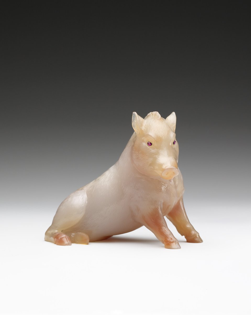 wikivictorian's tweet photo. Wild boar, seated, carved in pale silver-grey to pinkish-brown chalcedony with cabochon ruby eyes, by Fabergé, 1908. Royal Collection.   Bought by King George V, when Prince of Wales, from Fabergé's London branch, December 1909 (£31) https://t.co/hsY7CNVGXC