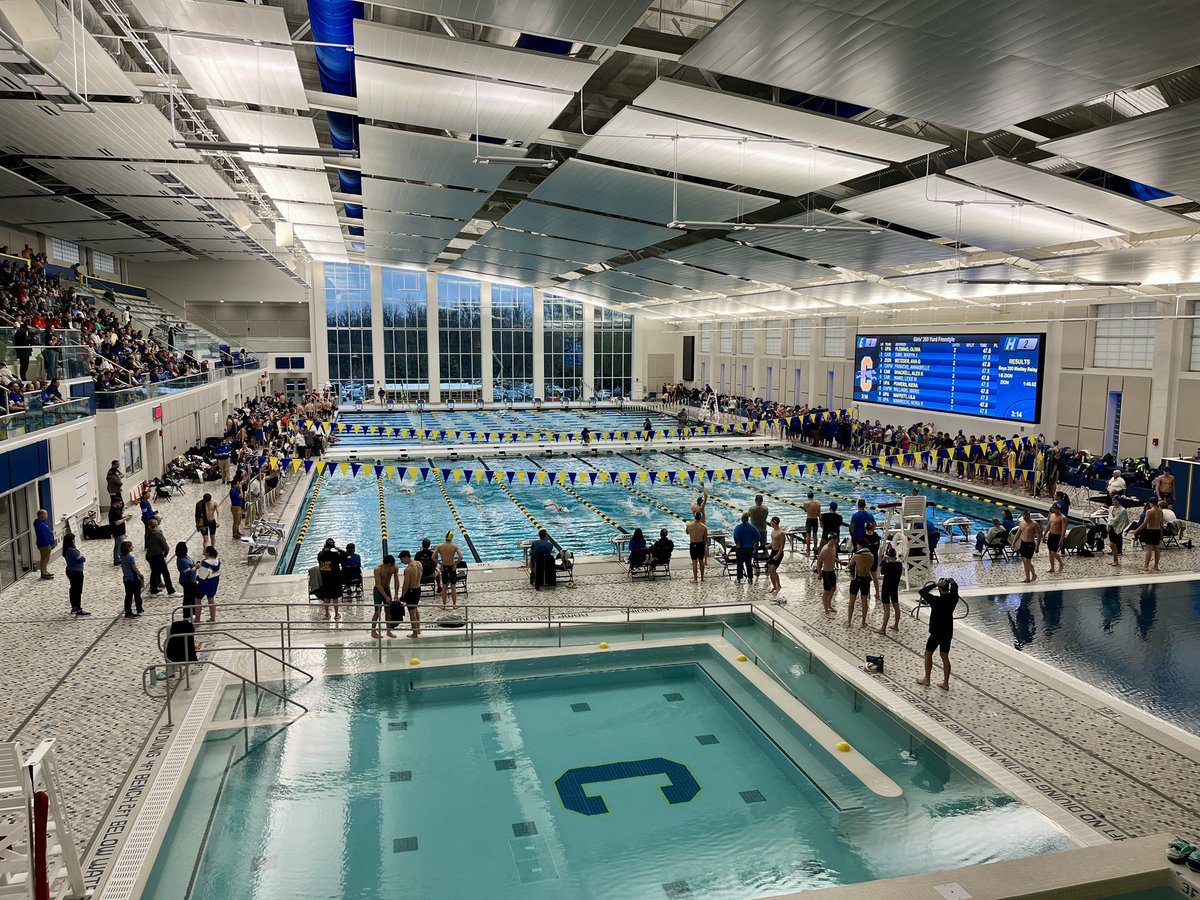 TomOestreich's tweet photo. It’s not everyday that you get to watch an Olympic Coach, an Olympic Gold and Silver medalist, and the State Championship Carmel Swimming and Diving Teams!  The new Natatorium is simply perfect!  Go Hounds! 🔵🟡 https://t.co/smXtkJ93zV