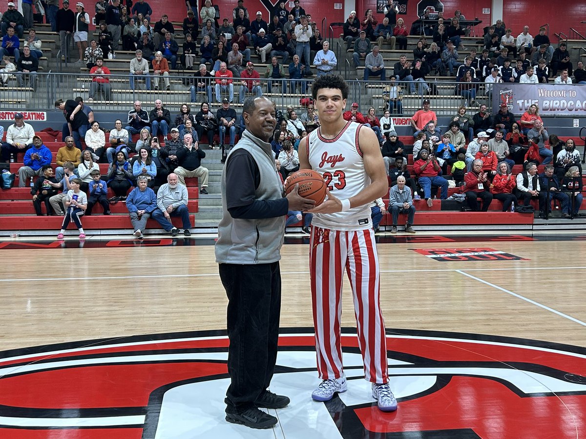 The official passing of the torch.

Derrick Johnson honors Jordan Martin for breaking his school record for career points.