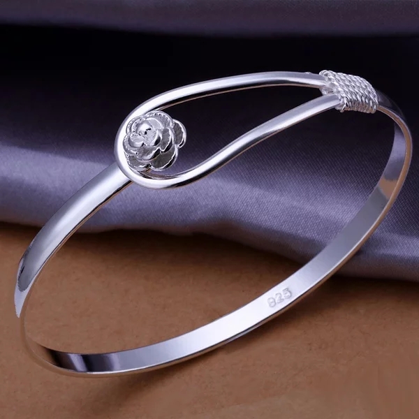 ruby_redsky's tweet image. silver rose clasp bangle
