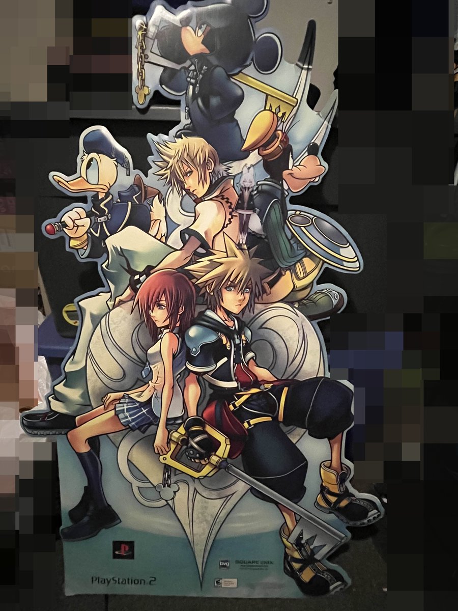 aroadroller's tweet image. did you know, that Tenma appears on the kingdom hearts 2 standee. she was set to appear in the game, but was removed due to already having an angry difficult to understand duck. #kanpainiki