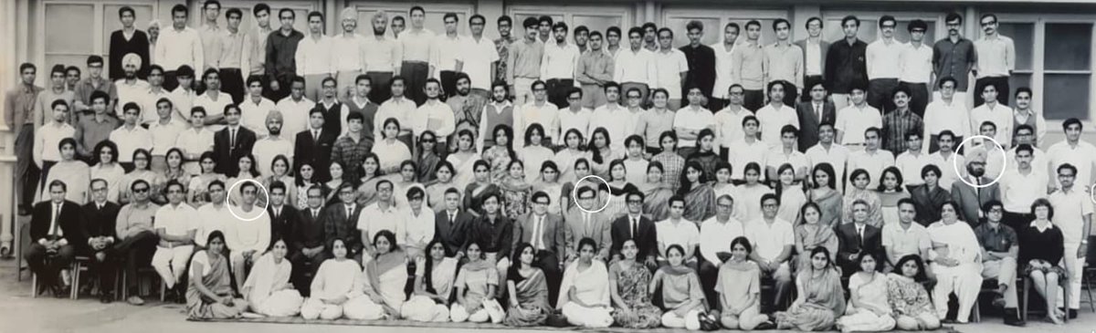 DrAmitMitra's tweet photo. We, as students of Dr Manmohan Singh, will deeply miss his warmth & affection.

The photo below, at Delhi School of Econ (1969), demonstrates Dr Singh’s humility. While Professors were seated in chairs, he quietly came & stood among students. (Circles : Prof Amartya Sen, Dr Singh - I was there as outgoing President of Fraternity)

Ironically, standing next to Dr Singh on his left was Vinod Rai. 
Over 40 years later, Vinod’s Report, as CAG of India, created a storm against Dr Singh & his Govt, (2G & Coal ‘scams’),contributing to its downfall & the ascendency of Shri Narendra Modi in 2014.
But in 2015, Supreme Court stayed the prosecution of Dr Singh on the coal matter, saying that there was “not a whiff, let alone an allegation of quid pro quo..”.  It was too late !!
In 2017, CBI Court dismissed the charges on 2G, saying “some people created a scam by artfully arranging a few selected facts..”. Too late !
In 2021, Vinod apologised unconditionally in Court on a related matter. At that point the opposition called Vinod’s Report of 2012 a conspiracy to oust Dr Singh’s  Govt. Too late !!
A 54 year old picture (that Vinod had kindly sent me some years ago!) is worth a 1000 words…
May Dr Singh’s noble soul rest in peace