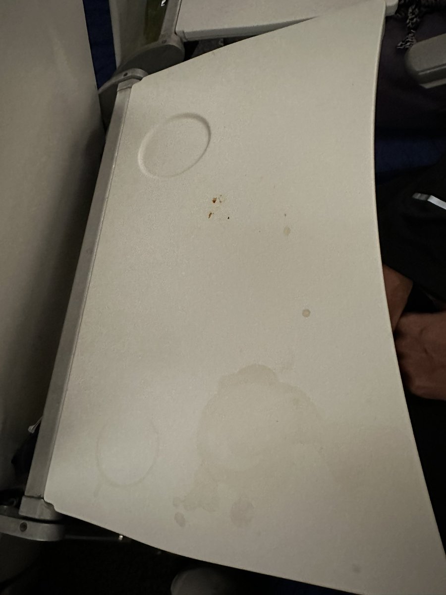 sumit13anand's tweet photo. @flyscoot sad state of affairs! Perth - Singapore TR9 (1750 delayed to 2145 - it’s 2145 and boarding started only 3-5 min back! See the tray table of 14E - atleast help us with a hygienic flight experience if being on time is secondary? https://t.co/XnjGhYfxUU