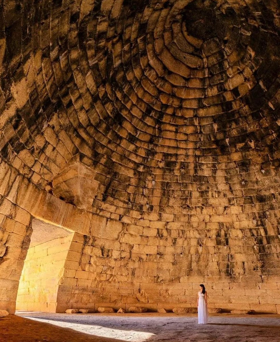 archeohistories's tweet photo. Mycenaean Tholos Tomb :

The magnificent tholos known as the "Treasury of Atreus" or "Tomb of Agamemnon", is located near the remains of the ancient Greek city of Mycenae. This spectacular Bronze Age structure, built around 1250 BC, is probably unrelated to these two great kings mentioned by Homer,, but it is the most spectacular surviving tomb from the Mycenaean period.

Tholos Tomb is a round, beehive shaped structure famously built by the late Bronze Age Mycenean peoples. These were royal examples of the commonly employed chamber tomb. A rounded cut was made into a hillside, within which huge ashlar masonry would be employed to create a conical structure, with a wide entryway leading to it, known as a dromos. The chamber itself was built by placing each successive course of stonework out over the previous one, tapering the diameter of the room gradually up to the top. The cut was then refilled on top of the structure, creating a large underground chamber. The dead we laid on the floor of the main room, or in rare cases, in smaller separate rooms built adjacent to it. 

These tombs are conspicuous, and could be huge. The most famous of these tholoi is the so-called “Treasury of Atreus” at Mycenae. The central room is 14.6m across and 13.5m high at it’s apex. Even the smaller of the rectangular stone blocks of which it is constructed would have involved significant engineering to quarry and move. The doorway, itself a gigantic 5.4 by 2.7m, was spanned by a single lintel stone, thought to weigh over 120 tons, with a relieving triangle above it. Though employing technically simple architectural techniques, these tombs were built to achieve monumental effect, often so successfully as to merit offerings from later peoples and associations with hero cults.

They were similar in design to chamber tombs with one important difference. Instead of being hollowed out of the hillside, tholoi were built out of stone blocks and then covered with earth. Usually the side of a hill would be cut away to provide space for the construction of a dome-shaped burial chamber (tholos) and a sloping passage (dromos) leading to a deep doorway (stomion). The tholos was built out of ashlar blocks using a technique known as corbelling to create the dome. This involved laying the stones so that each horizontal course slightly overlapped the one below it until the distance was small enough so that a single slab could be used to close the gap. The dirt from the excavation was replaced until the tholos was at least partly covered. In later examples, the dromos lined with ashlar blocks as well. With each burial, the stomion would have been walled shut and the dromos filled with earth.

This type of tomb is referred to by archaeologists as a tholos circles, these tholos tomb, from the Greek world for "dome" or "vault". Like the grave circles, these tholos tombs were intended to serve as repositories for the dead along with exceptionally lavish burial goods. The earliest examples, such as the Tomb of Agisthos, were built of rubble and lack a relieving triangle above lintel. Unfortunately, the majority of tombs had been robbed and so the dating scheme is based on very slender evidence. The Treasury of Atreus at Mycenae is the largest and best-preserved of the surviving tholoi.

At the same time, the size and appearance of the tholos tombs alone were enough to make a statement of overwhelming power and magnificence. Constructed, like the fortification walls of the citadel, of massive blocks of stone, these tholos tombs represent the largest space enclosed by a single span until the Pantheon was built by the Romans some 13 Centuries later.

📷 : Credit to the Owner

#archaeohistories