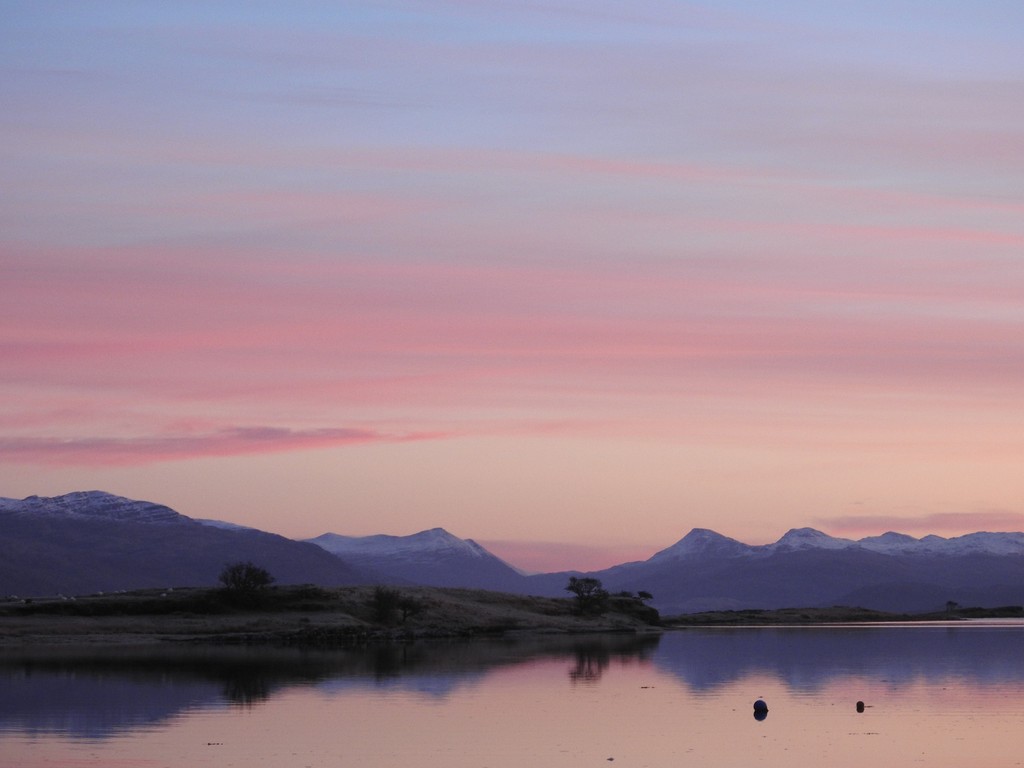 February sunrise from the bedroom window at Oystercatchers.  This view could be yours next half term.  Book now at tinyurl.com/539fjcdb for best prices at this lovely waterfront cottage on the Isle of Skye, where you can keep an eye out for the neighbourhood otter on the shore