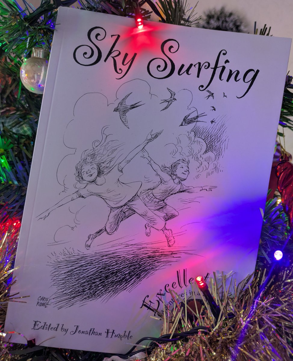Home from visiting, to this beauty. Here it is surfing the festive sky (tree). Thanks &amp; congratulations to <a href="/JonathanHumble/">Jonathan Humble 🎈</a> &amp; <a href="/mooseandmouse/">Colin West</a>. Some favourites from <a href="/TheDirigible/">The Dirigible Balloon 🎈</a>, plus fab poems new to me, too. All for a great cause <a href="/JARProject/">JAR Project (now on B___sky)</a> ✨ Thrilled to have a poem included.